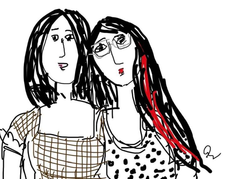 Sisters, not to miss the red streaks in ones hair.My granddaughters.